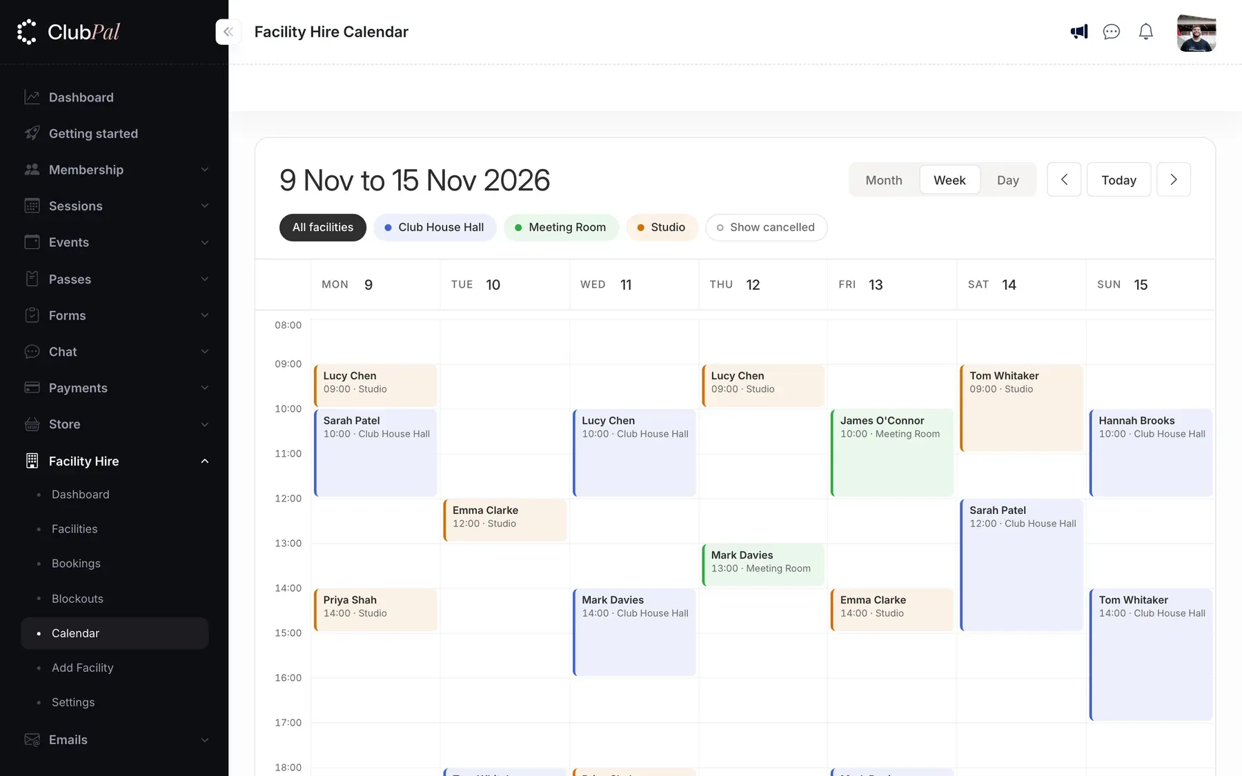 The admin facility hire calendar showing a week of bookings across a hall, a studio and a meeting room, each space in its own colour, with the hirer's name and start time on every booking